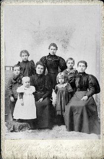 3 Kilgore sisters.  The children aren't identified.
